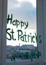 Drawing St. Patrick`s Day Child painting green three-leaved shamrocks indoor, home decoration, quarantine family leisure