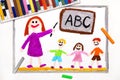 Drawing: teacher and students in the classroom. Teaching children the alphabet