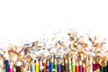 Drawing tools background. Lot of colorful pencils frame with sawdust and shavings on white Royalty Free Stock Photo