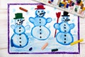 Drawing: tree happy snowmans and snowflakes. Royalty Free Stock Photo