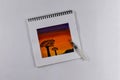 Drawing a watercolor of nature against the background of an evening sunset, sketches on a notebook Royalty Free Stock Photo