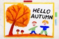 drawing:Words HELLO AUTUMN, smiling friends and trees with yellow and orange leaves