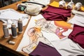 drawn athletic wear designs laid out on a table