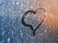 Drawn heart on the frozen window Royalty Free Stock Photo