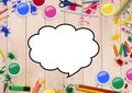 Drawn speech bubble with color pencils and paint on wooden background Royalty Free Stock Photo