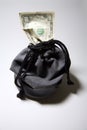 Drawstring bag with money Royalty Free Stock Photo