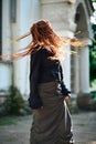 Dreadlocks fashionable girl having fun and turns head fast