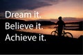 Dream it. Believe it. Achieve it. Motivation quotes. Silhouette of bicycle rider at beautiful sunset. Sports motivation, positive