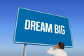 Dream big against bright blue sky Royalty Free Stock Photo