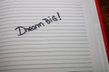Dream big, handwriting text on page of office agenda. Copy space Royalty Free Stock Photo