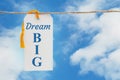 Dream Big message white gift tag over sky Royalty Free Stock Photo
