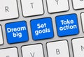 Dream big, Set goals Take action - Inscription on Blue Keyboard Keys Royalty Free Stock Photo