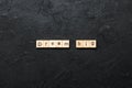 Dream big word written on wood block. Dream big text on cement table for your desing, Top view concept Royalty Free Stock Photo