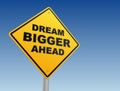 Dream bigger ahead road sign concept 3d illustration