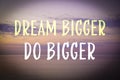 Dream Bigger Do Bigger. Inspirational quote motivating to set life goals freely and forget about reasons that can hold back. Text