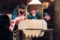 Dream about career of cosmonaut. Father and small boy in paper rocket with American flag. Happy independence day of the Royalty Free Stock Photo