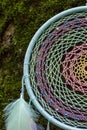 Dreamcatcher made of feathers, leather, beads, and ropes Royalty Free Stock Photo