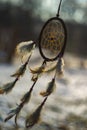Dream catcher with feathers threads and beads rope hanging and nice bokeh background Royalty Free Stock Photo