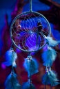 Dream catcher on a forest at night