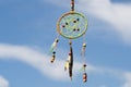 Dream catcher in the wind against the sky, selective focus Royalty Free Stock Photo