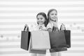 Dream of every girl shopping together with best friend. Girls children best friends hold bunch of shopping bags