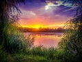 Dream fantasy landscape view of danube delta and blue colored dramatic sky at sunset