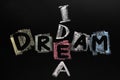 Dream and idea written in colorful chalk Royalty Free Stock Photo