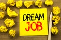 Dream Job. Business concept for Dreaming About Career written on sticky note paper on the vintage background. Folded yellow papers Royalty Free Stock Photo