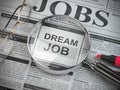 Dream job concept. Job search and employment. Magnified glass with job classified ads in newspaper Royalty Free Stock Photo