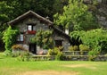Mountain stone house and garden in the Italian Alps