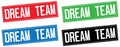 DREAM TEAM text, on rectangle stamp sign.