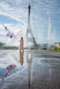 Dream travel - young woman with balloons walking near Eiffel Tower in Paris Royalty Free Stock Photo