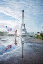 Dream travel - young woman with balloons walking near Eiffel Tower in Paris Royalty Free Stock Photo