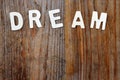 Dream word on wooden background Royalty Free Stock Photo