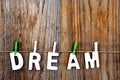 Dream word on wooden background Royalty Free Stock Photo