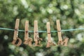 DREAM word written by hanged wooden letters on rope at garden