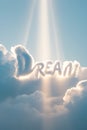 DREAM Written in Clouds with Sun Rays Breaking Through dream light Royalty Free Stock Photo