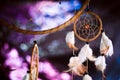 Dreamcatcher against a background of purple sunset dark