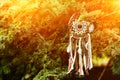 Dreamcatcher, american native amulet on sunset. Shaman Royalty Free Stock Photo