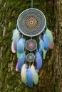 Dreamcatcher made of feathers, leather, beads, and ropes Royalty Free Stock Photo