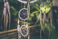 Dreamcatcher sunset , boho chic, ethnic amulet,symbol, tropical background.