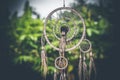 Dreamcatcher sunset , boho chic, ethnic amulet,symbol, tropical background.