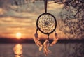 Dreamcatcher sunset sky, boho chic, ethnic amulet symbol Indigenous Peoples Day