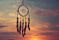 Dreamcatcher sunset sky, boho chic, ethnic amulet symbol Indigenous Peoples Day