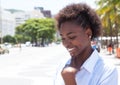 Dreaming african american woman in the city Royalty Free Stock Photo