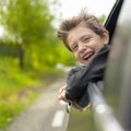 Dreaming Boy Looking Out From the Car Window Royalty Free Stock Photo