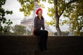 Dreaming girl with red beret in Paris