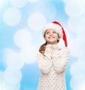 Dreaming girl in santa helper hat Royalty Free Stock Photo