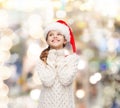 Dreaming girl in santa helper hat Royalty Free Stock Photo