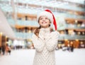 Dreaming girl in santa helper hat Royalty Free Stock Photo